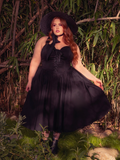 The Ambrosia Dress in Black is a masterpiece of gothic glamour. With its flowing fabric and elegant silhouette, it whispers tales of dark romance and forbidden love, perfect for candlelit evenings.