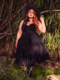 The Ambrosia Dress in Black is a vision of gothic beauty. Its elegant design and rich, dark hues create an air of mystery and enchantment, ideal for twilight soirées and whispered secrets.