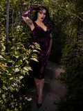 Reclined in velvet shadow, this gothic clothing piece exudes Old World decadence and cabaret charm.