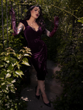 Delicate lace trims crown this gothic dress with elegance, reminiscent of mourning veils and dark poetry.