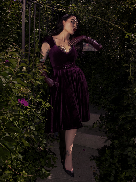The skirt flares out beautifully mid-twirl, capturing the dress’s vintage-inspired volume and movement.