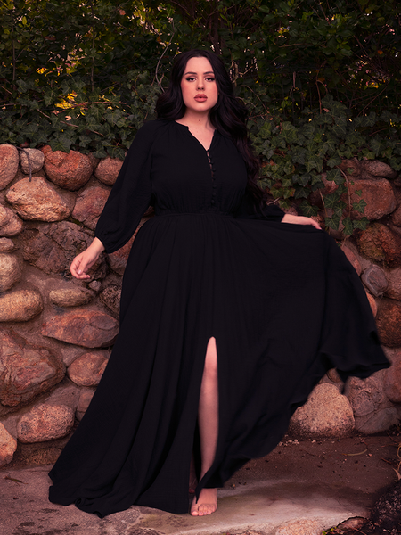 Amidst thorns and faded petals, this gothic clothing piece blooms in blackest beauty.
