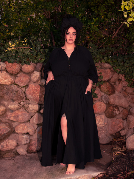 Towering and timeless, this gothic dress captures the full power of moonlit mystique.