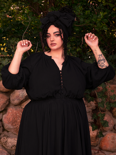 Adorned in silver and onyx, this gothic clothing look is a spellbinding symphony of style.