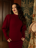 Effortlessly enchanting, this crimson cycling sweater features rich pleating and bishop sleeves, making it a must-have for lovers of gothic elegance.