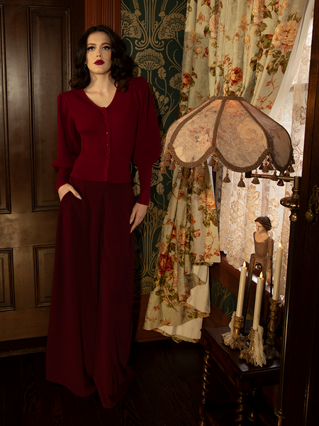 A decadent dance of fabric and hue, these pants summon a storm of elegance, inspired by antique velvet and blood-kissed roses.