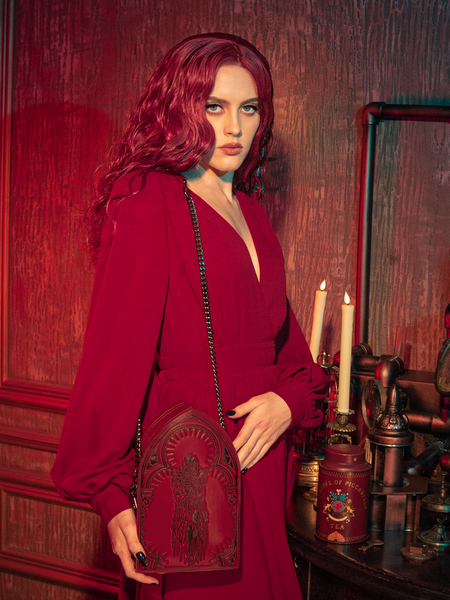 Witness the haunting beauty as models show off the CRIMSON PEAK™ Ghost Shoulder Bag from the gothic clothing brand La Femme en Noir.