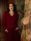 Designed for dark romantics, this crimson knit cardigan envelops you in warmth and elegance, with soft knit fabric and a structured, vintage-inspired silhouette.