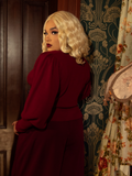 Wrap yourself in Victorian romance with this deep crimson knit cardigan, boasting puffed sleeves, delicate pleats, and a structured fit for timeless allure.