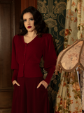 A statement of passion and elegance, this crimson cardigan offers a sculpted Victorian fit, delicate button accents, and a rich hue that captivates.