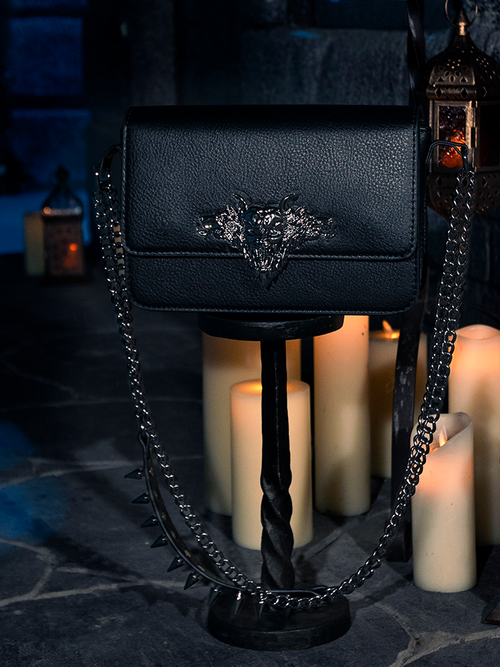 Surrounded by the enchanting glow of flickering candles, the BRAM STOKER'S DRACULA Gargoyle Sculpture Quilted Crossbody Bag in Black finds its place, a creation by the gothic fashion house, La Femme en Noir.