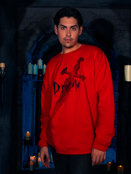 A vision of loveliness, the human model elegantly wears the "Love Never Dies" Sweatshirt in Red, a captivating piece from La Femme en Noir's BRAM STOKER'S DRACULA collection.