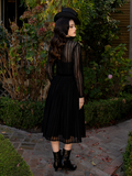Perfect with lace gloves or a velvet choker, the Funeral Dress in Black completes a look of mournful glamour and eternal style.
