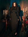 With the Lady Mourning Victorian Gown, experience an eclipse of the heart. This garment embodies the moment when light yields to darkness, beauty intertwines with sorrow, and fashion transcends time. It's a celebration of the gothic soul's complexity, draped in the finest fabrics.