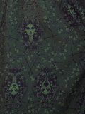 Command the room in this bewitching dress, adorned with Medusa-inspired motifs. The faux wrap silhouette hugs curves in dark sophistication, making it a go-to piece for evening intrigue or artistic gatherings.