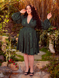 This faux wrap dress is a masterpiece of gothic seduction, featuring Medusa’s serpentine print in darkly elegant hues. Its versatile style transforms from day to night with a mere shift of accessories.
