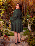The Medusa-print faux wrap dress invites you to step into a mythic realm of style. Flowing fabric and serpentine patterns weave a tale of timeless gothic enchantment, perfect for those who command attention.