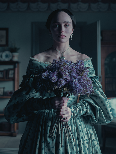 The Ellen Victorian Dress enchants with a blue floral design and delicate detailing, perfect for moonlit gatherings or vintage-inspired soirées.