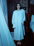 The Victorian Sleeping Dress offers a hauntingly elegant look, with its soft ivory tones and delicate tailoring perfect for romantic nights.