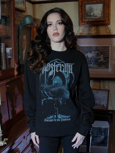 The Nosferatu Castle Sweatshirt features a soft, relaxed fit and a bold, shadowy castle graphic, bringing dark refinement to casual attire.