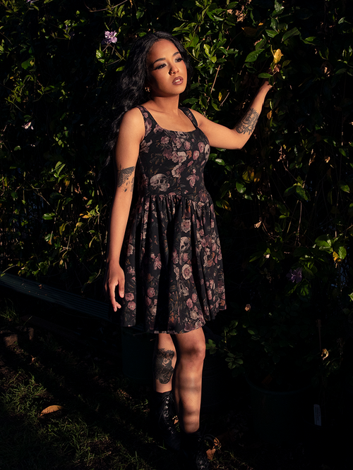 Crafted for twilight adventures, the Novella Mini Dress in Decayed Beauty Print flatters with a playful cut while echoing dark sophistication.