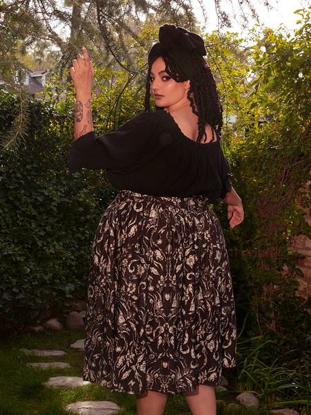 The Ritual Peasant Top channels ancient rites in a modern silhouette.