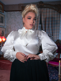 High neck and lace detail, a portrait of purity with a ghostly twist—perfect for moonlit letters and lace-gloved secrets.