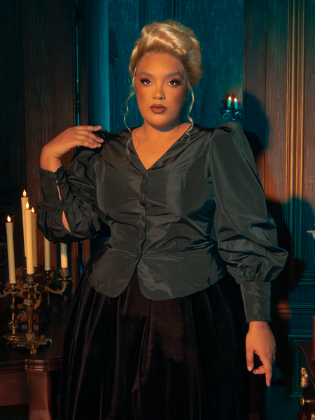 Modeling the Taffeta Edwardian Blouse in Black, gothically gorgeous female models showcase its intricate details through diverse poses.