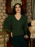 Perfect for evening strolls or candlelit reading, this Victorian knit cardigan blends soft warmth with gothic refinement, featuring intricate knitwork and a romantic fit.