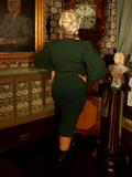 Step into a Victorian fairy tale with this hunter green knit cardigan, featuring a softly tailored waist, bishop sleeves, and a high neckline for dramatic charm.