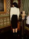 With its graceful structure and antique charm, this ivory Victorian cycling pullover is a must-have for lovers of gothic elegance and refined vintage fashion.