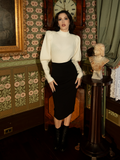Designed for the bold and the elegant, this ivory cycling pullover pairs classic Victorian detailing with modern comfort in a truly timeless design.