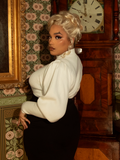 Embody Victorian elegance in this ivory cycling pullover, adorned with graceful pleating, delicate knit details, and a silhouette designed for movement and style.