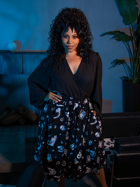 The La Femme en Noir's BEETLEJUICE™ Afterlife Skirt makes this female model look wickedly beautiful.