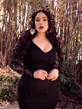 Waist level shot of Rachel Sedory wearing a black gothic dress.