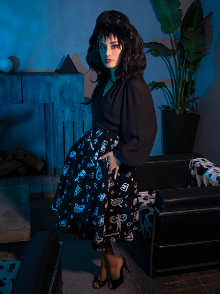 This beautiful female model looks devilishly stunning in the BEETLEJUICE™ Afterlife Skirt from La Femme en Noir.