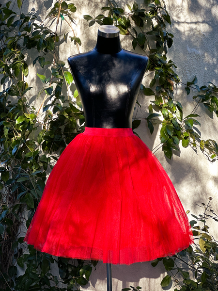 The Vintage Style Crinoline in Red photographed on a black mannequin.