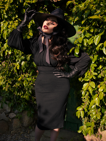 Micheline Pitt wearing the Salem Top in Black coupled with other black gothic retro clothing pieces to make up a gorgeously gothic look.