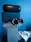 Product shot of the BEETLEJUICE™ Sandworm Spectacles with leather carrying case and cleaning towel.