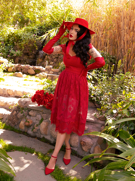 Partial profile full length shot of Micheline Pitt in the Southern Gothic Skirt in Crimson.