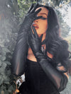 A shot of the glove's palm side, showing the reinforced stitching and durable vegan leather that defines La Femme en Noir’s commitment to quality.