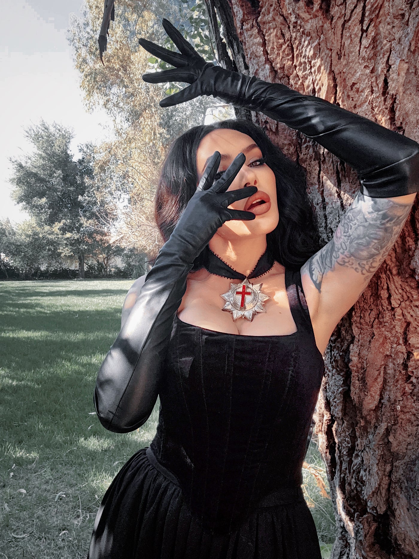 A view of the upper arm opening, designed to stay perfectly in place for a seamless transition from sleeve to glove in a darkly romantic outfit.
