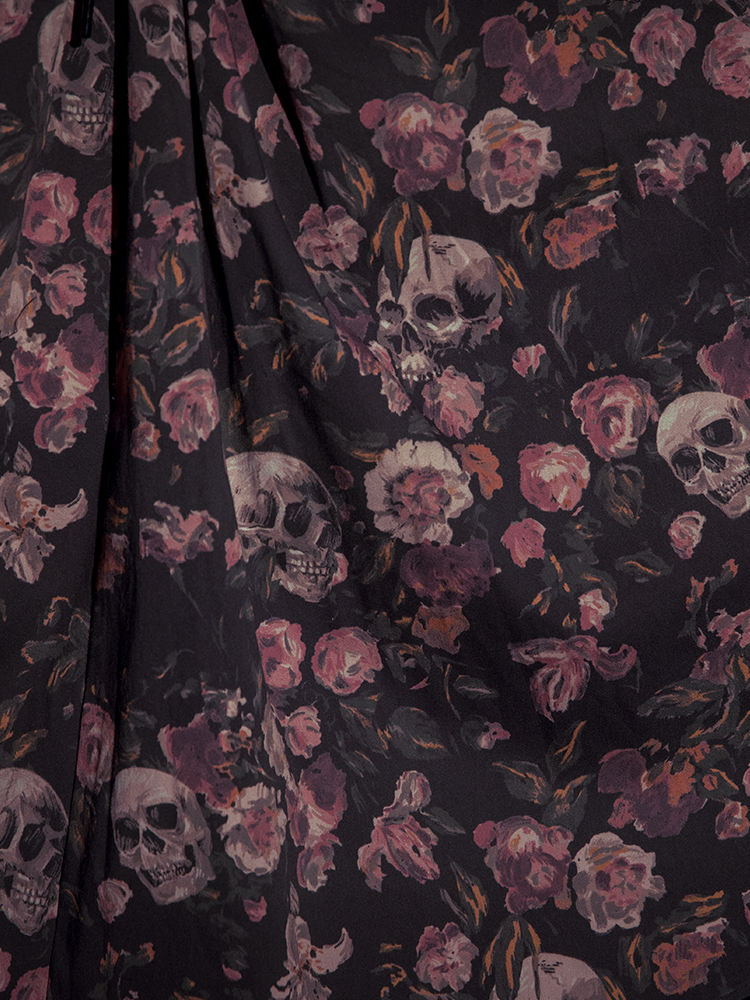 The Decayed Beauty motif blooms in dusky hues, wrapping the wearer in elegance both haunted and timeless.