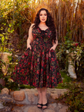 Draped in the Ambrosia Dress in Pomegranate Print, you'll embody the essence of gothic elegance. Its luxurious fabric and timeless design create a captivating aura, ideal for moonlit gardens and secret encounters.