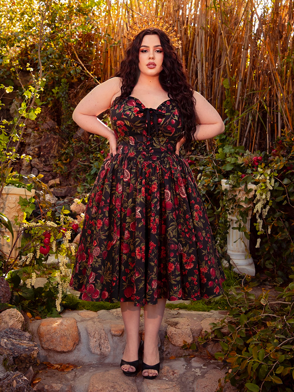 Step into the night with the Ambrosia Dress in Pomegranate Print. This gothic creation, with its sleek silhouette and flowing fabric, is perfect for twilight gatherings and moonlit dances.