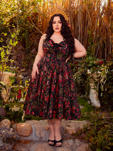 The Ambrosia Dress in Pomegranate Print is a darkly romantic creation. With its timeless design and luxurious fabric, it evokes the spirit of gothic poetry and forbidden love, perfect for candlelit soirées.