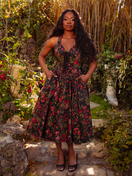 Draped in the Ambrosia Dress in Pomegranate Print, you'll embody the essence of gothic glamour. Its classic design and luxurious fabric create a captivating aura, ideal for twilight soirées and secret encounters.