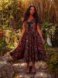 The Ambrosia Dress in Pomegranate Print is a hauntingly romantic creation. Its sleek design and flowing fabric create an air of mystery and enchantment, perfect for moonlit gatherings and midnight dances.