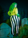 Command attention in the BEETLEJUICE™ Striped Pants. These gothic-chic trousers boast sharp monochrome stripes and a flattering silhouette.