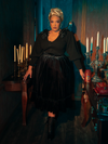 Witness the enchantment of the hauntingly gorgeous Victorian Velvet Bustle Skirt in Black as models bring it to life for La Femme en Noir, the gothic clothing brand.